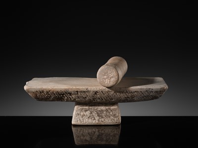 Lot 7 - A SANDSTONE PESANI (GRINDING STONE) AND GRINDER, ANGKOR PERIOD