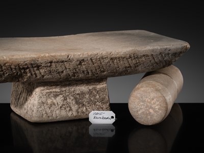 Lot 7 - A SANDSTONE PESANI (GRINDING STONE) AND GRINDER, ANGKOR PERIOD