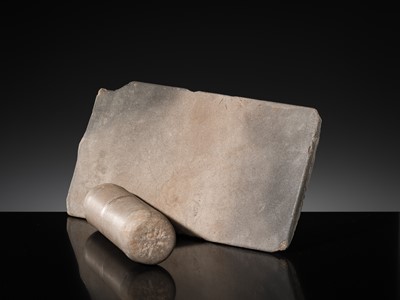 Lot 7 - A SANDSTONE PESANI (GRINDING STONE) AND GRINDER, ANGKOR PERIOD