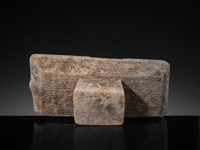 Lot 7 - A SANDSTONE PESANI (GRINDING STONE) AND GRINDER, ANGKOR PERIOD