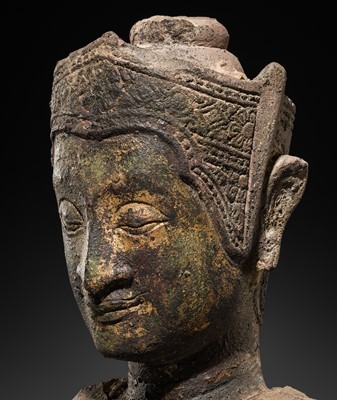 Lot 27 - A LARGE BRONZE-COATED SANDSTONE HEAD OF CROWNED BUDDHA, PHRA CHAO SONG KHRUANG (‘A LORD WEARING ORNAMENTS’), AYUTTHAYA PERIOD