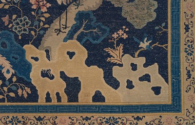 Lot 514 - A LARGE PEKING WOOL ‘ONE HUNDRED BIRDS WORSHIPPING THE PHOENIX’ CARPET, LATE QING DYNASTY