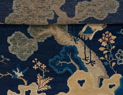 Lot 514 - A LARGE PEKING WOOL ‘ONE HUNDRED BIRDS WORSHIPPING THE PHOENIX’ CARPET, LATE QING DYNASTY