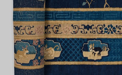 Lot 514 - A LARGE PEKING WOOL ‘ONE HUNDRED BIRDS WORSHIPPING THE PHOENIX’ CARPET, LATE QING DYNASTY