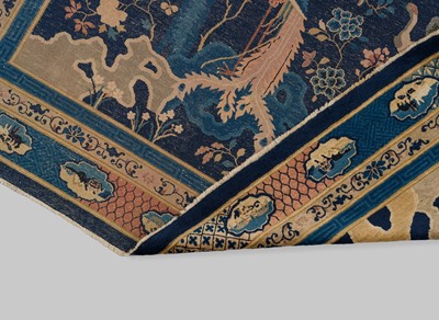 Lot 514 - A LARGE PEKING WOOL ‘ONE HUNDRED BIRDS WORSHIPPING THE PHOENIX’ CARPET, LATE QING DYNASTY