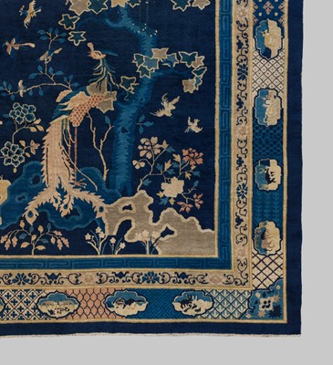 Lot 514 - A LARGE PEKING WOOL ‘ONE HUNDRED BIRDS WORSHIPPING THE PHOENIX’ CARPET, LATE QING DYNASTY