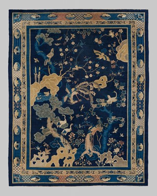 Lot 514 - A LARGE PEKING WOOL ‘ONE HUNDRED BIRDS WORSHIPPING THE PHOENIX’ CARPET, LATE QING DYNASTY