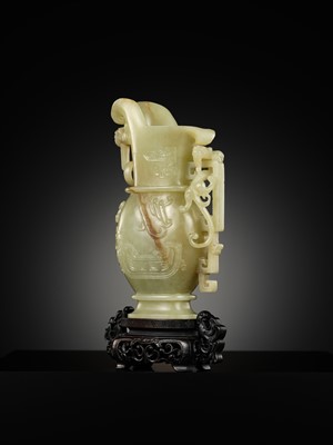 Lot 107 - A YELLOW JADE ARCHAISTIC ‘DRAGON AND PHOENIX’ EWER, GONG, QIANLONG PERIOD