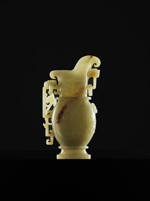 Lot 107 - A YELLOW JADE ARCHAISTIC ‘DRAGON AND PHOENIX’ EWER, GONG, QIANLONG PERIOD