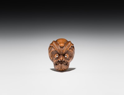 Lot 549 - A WOOD MASK NETSUKE OF AN OCTOPUS-USOFUKI, ATTRIBUTED TO KOKEISAI SANSHO