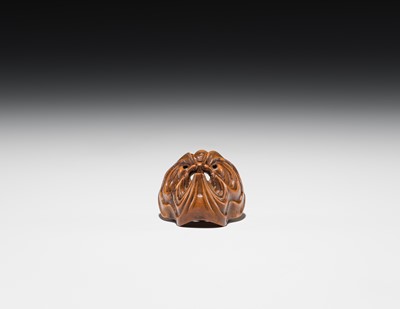 Lot 549 - A WOOD MASK NETSUKE OF AN OCTOPUS-USOFUKI, ATTRIBUTED TO KOKEISAI SANSHO