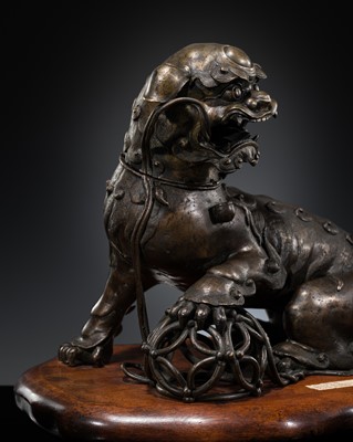 Lot 388 - A BRONZE ‘BUDDHIST LION’ CENSER, 17TH CENTURY