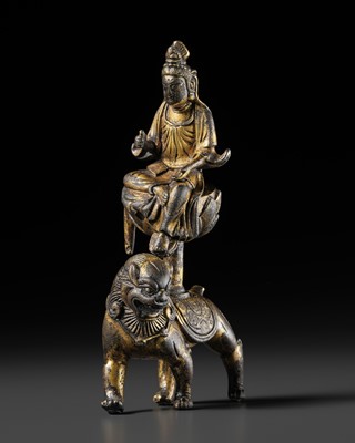 Lot 41 - A GILT BRONZE FIGURE OF MANJUSHRI ON A LION, SONG DYNASTY