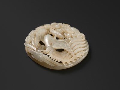 Lot 440 - A RETICULATED WHITE JADE ‘PHOENIX’ PLAQUE, LATE SONG TO YUAN DYNASTY