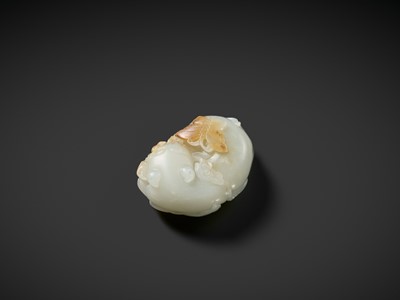 Lot 945 - A WHITE AND RUSSET JADE CARVING OF A CAT WITH BUTTERFLY AND LINGZHI