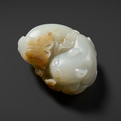 Lot 457 - A WHITE AND RUSSET JADE CARVING OF A CAT WITH BUTTERFLY AND LINGZHI