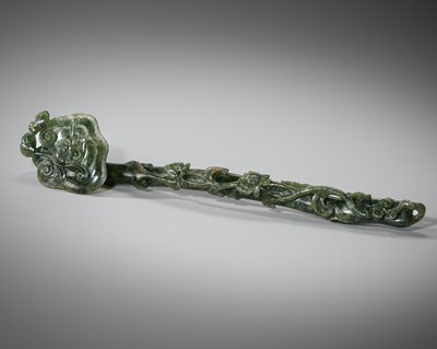 Lot 468 - A SPINACH-GREEN JADE ‘LINGZHI AND LOTUS’ RUYI SCEPTER, MID-QING DYNASTY