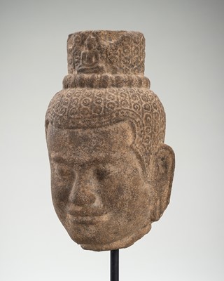 Lot 976 - A SANDSTONE HEAD OF AVALOKITESHVARA, 12TH CENTURY OR LATER