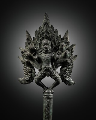 Lot 266 - A BRONZE ‘GARUDA AND NAGA’ FINIAL, ANGKOR PERIOD, BAYON STYLE