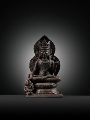 Lot 174 - A SILVER-INLAID COPPER ALLOY FIGURE OF RATNASAMBHAVA, KASHMIR, 7TH-9TH CENTURY
