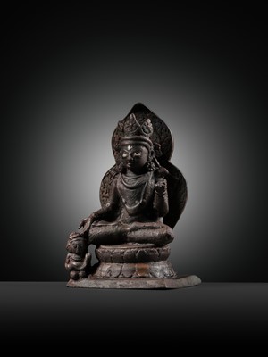 Lot 174 - A SILVER-INLAID COPPER ALLOY FIGURE OF RATNASAMBHAVA, KASHMIR, 7TH-9TH CENTURY