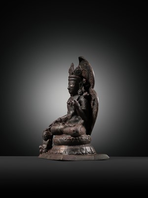 Lot 174 - A SILVER-INLAID COPPER ALLOY FIGURE OF RATNASAMBHAVA, KASHMIR, 7TH-9TH CENTURY