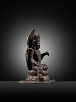Lot 174 - A SILVER-INLAID COPPER ALLOY FIGURE OF RATNASAMBHAVA, KASHMIR, 7TH-9TH CENTURY