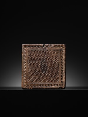 Lot 189 - A SANDALWOOD VOTIVE PLAQUE OF A CROWNED BUDDHA, WEST INDIA, 1ST MILLENNIUM AD
