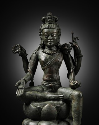 Lot 609 - A SILVER-INLAID BRONZE FIGURE OF LOKESHVARA PADMAPANI, SWAT VALLEY OR KASHMIR, 7TH-8TH CENTURY