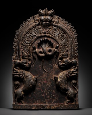 Lot 631 - A CARVED WOOD STELE WITH MYTHICAL BEASTS, SOUTH INDIA, 17TH-18TH CENTURY