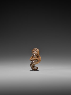 Lot 235 - NAITO TOYOMASA: AN IMPORTANT WOOD MASK NETSUKE OF WARAI JO TYPE DEPICTING A SELF-PORTRAIT OF THE ARTIST, THE REVERSE CARVED AS HIS GHOST