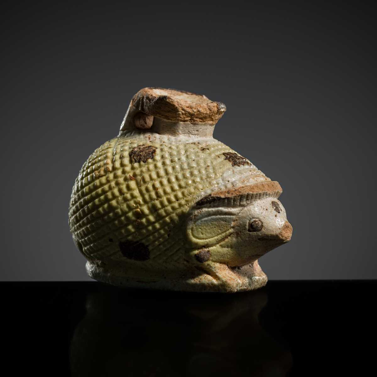 Lot 79 - A GRAECO-EGYPTIAN FAIENCE ‘HEDGEHOG’ ARYBALLOS, 6TH-4TH CENTURY BC