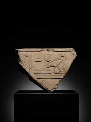 Lot 24 - A WALL RELIEF FRAGMENT DEPICTING AN IBIS, PTOLEMAIC PERIOD
