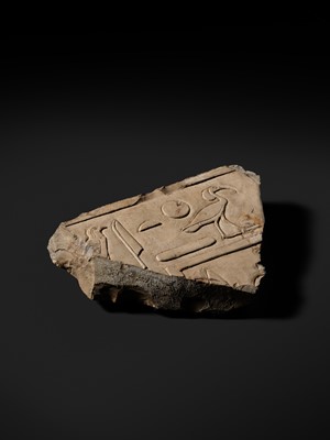 Lot 24 - A WALL RELIEF FRAGMENT DEPICTING AN IBIS, PTOLEMAIC PERIOD