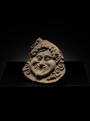 Lot 80 - A TERRACOTTA GORGONEION ANTEFIX