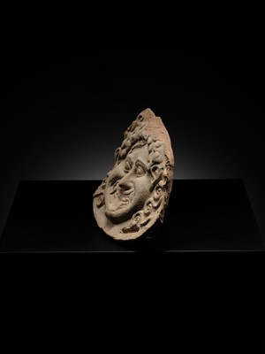 Lot 80 - A TERRACOTTA GORGONEION ANTEFIX