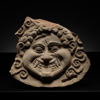 Lot 80 - A TERRACOTTA GORGONEION ANTEFIX