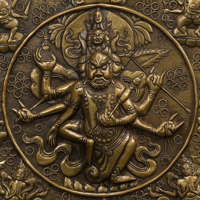 Lot 304 - A BRONZE REPOUSSÉ ‘WRATHFUL DEITY’ VOTIVE PLAQUE, TIBET, 18TH-19TH CENTURY