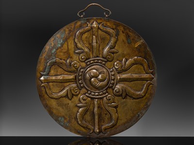 Lot 304 - A BRONZE REPOUSSÉ ‘WRATHFUL DEITY’ VOTIVE PLAQUE, TIBET, 18TH-19TH CENTURY