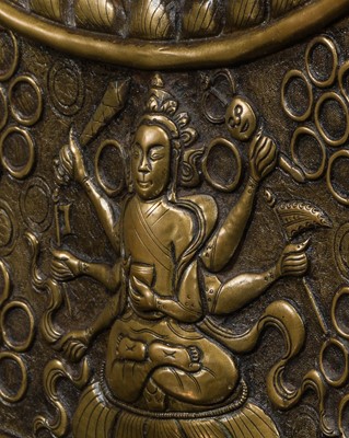 Lot 304 - A BRONZE REPOUSSÉ ‘WRATHFUL DEITY’ VOTIVE PLAQUE, TIBET, 18TH-19TH CENTURY