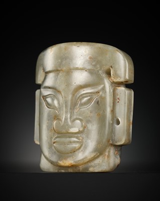 Lot 97 - AN UNUSUAL JADE PENDANT IN THE FORM OF A MYSTICAL HEAD, SHIJIAHE CULTURE