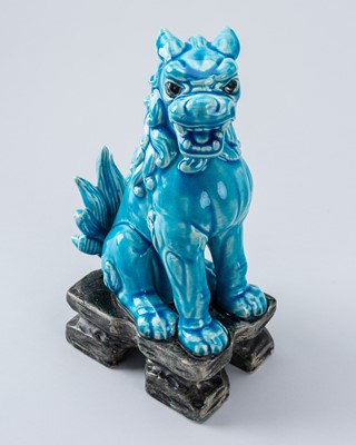 Lot 1968 - A TURQUOISE GLAZED PORCELAIN BUDDHIST LION, REPUBLIC PERIOD