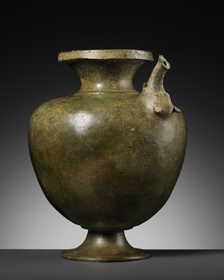 Lot 667 - A RARE BRONZE EWER WITH A MAKARA SPOUT, JAVA, INDONESIA, 10TH-11TH CENTURY