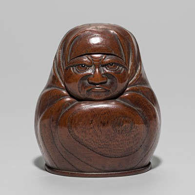 Lot 33 - A FINE AND AMUSING WOOD TONKOTSU WITH DARUMA AND OKAME