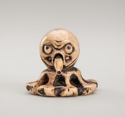 Lot 428 - AN ANTLER KARAKURI (TRICK) NETSUKE OF AN OCTOPUS