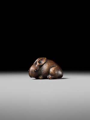 Lot 178 - HIDARI ISSAN: A FINE WOOD NETSUKE OF A HARE