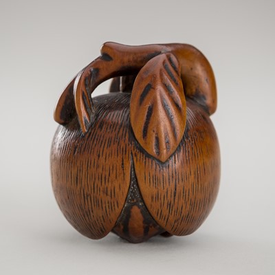 Lot 1359 - YOSHIKIYO: AN ANABORI WOOD NETSUKE OF A CHESNUT