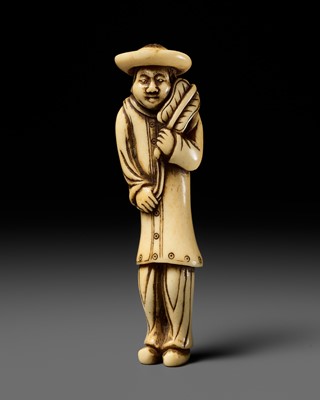 Lot 511 - A FINE ANTLER NETSUKE OF A DUTCHMAN WITH A FAN