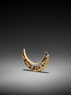 Lot 256 - A VERY RARE BOAR TUSK NETSUKE WITH LUNAR HARES INSIDE THE CRESCENT MOON