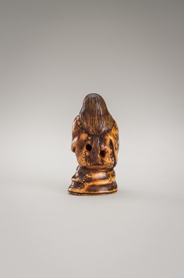 Lot 364 - MITSUHIRO: AN ANTLER NETSUKE OF OKAME